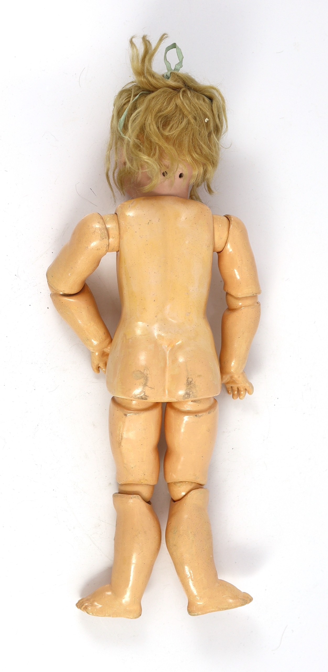 A J.D. Kestner bisque doll, German, circa 1910, 18in.